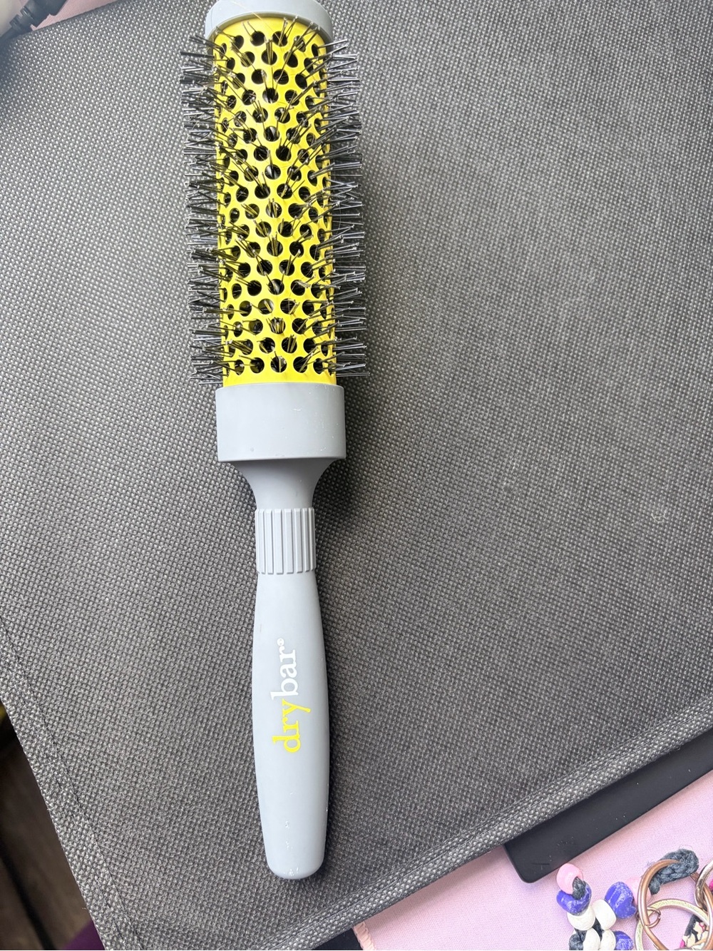 Drybar yellow and gray round vent styling brush